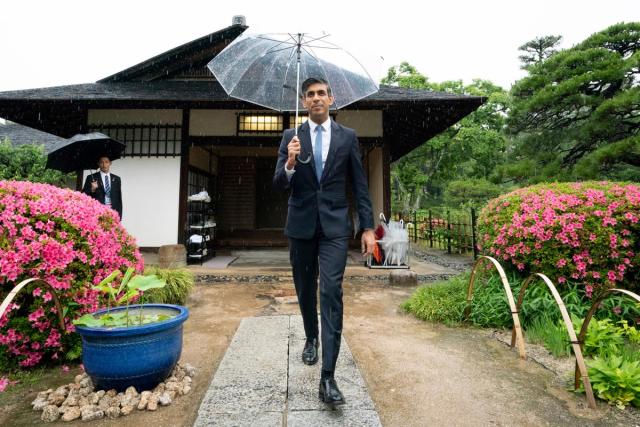 Rishi Sunak visits the Shukkeien Garden in Hiroshima (AP)
