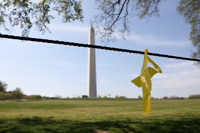 The National Mall and grounds of the Washington Monument remain largely empty to try to limit the spread of Covid-19 during the coronavirus disease pandemic in Washington