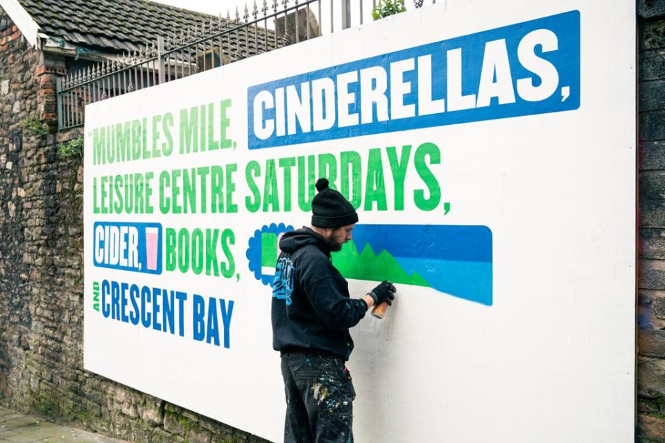 Murals painted on hoardings around Swansea are to welcome concertgoers. (Johan B. Skre, @photomanjohan)