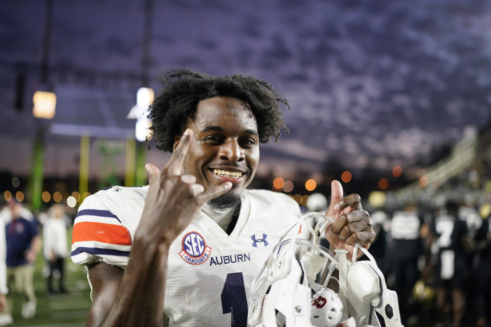 Auburn cornerback Nehemiah Pritchett celebrates the teams win against Vanderbilt after an NCAA college football game Saturday, Nov. 4, 2023, in Nashville, Tenn. (AP Photo/George Walker IV)