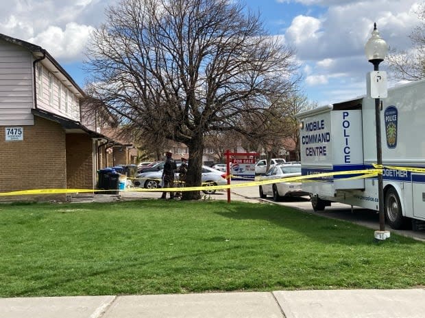 Peel police have set up a mobile command centre outside a home in Mississauga where a person was found dead early Sunday. The person was found with 'obvious signs of trauma.' (Keith Burgess/CBC - image credit)