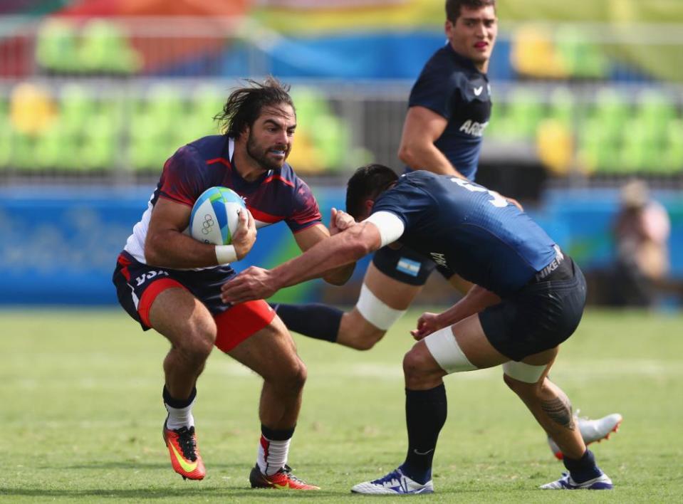 Ebner is tackled by Axel Muller of Argentina in Rio in 2016.