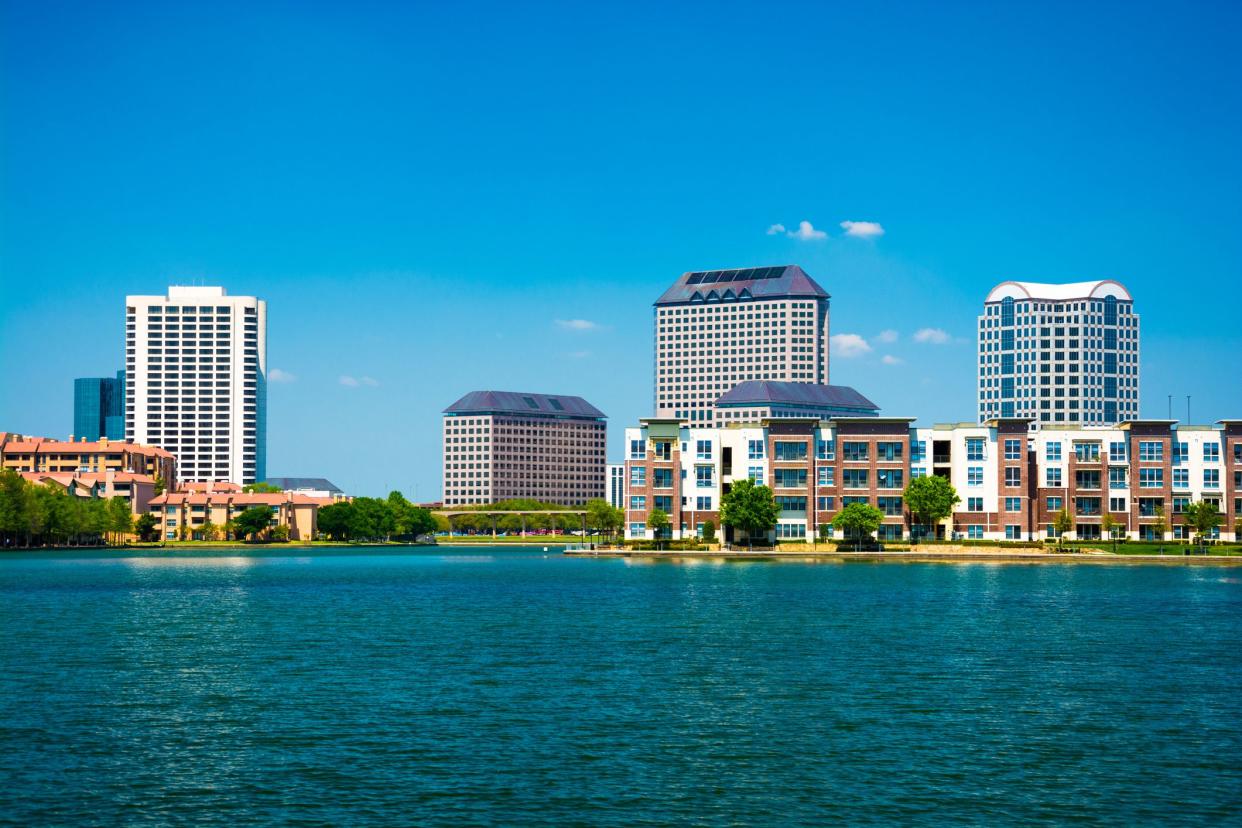 Skyline of the Las Colinas area of Irving, Texas with Lake Carolyn in the foreground.  Irving is a part of the Dallas - Fort Worth Metroplex.