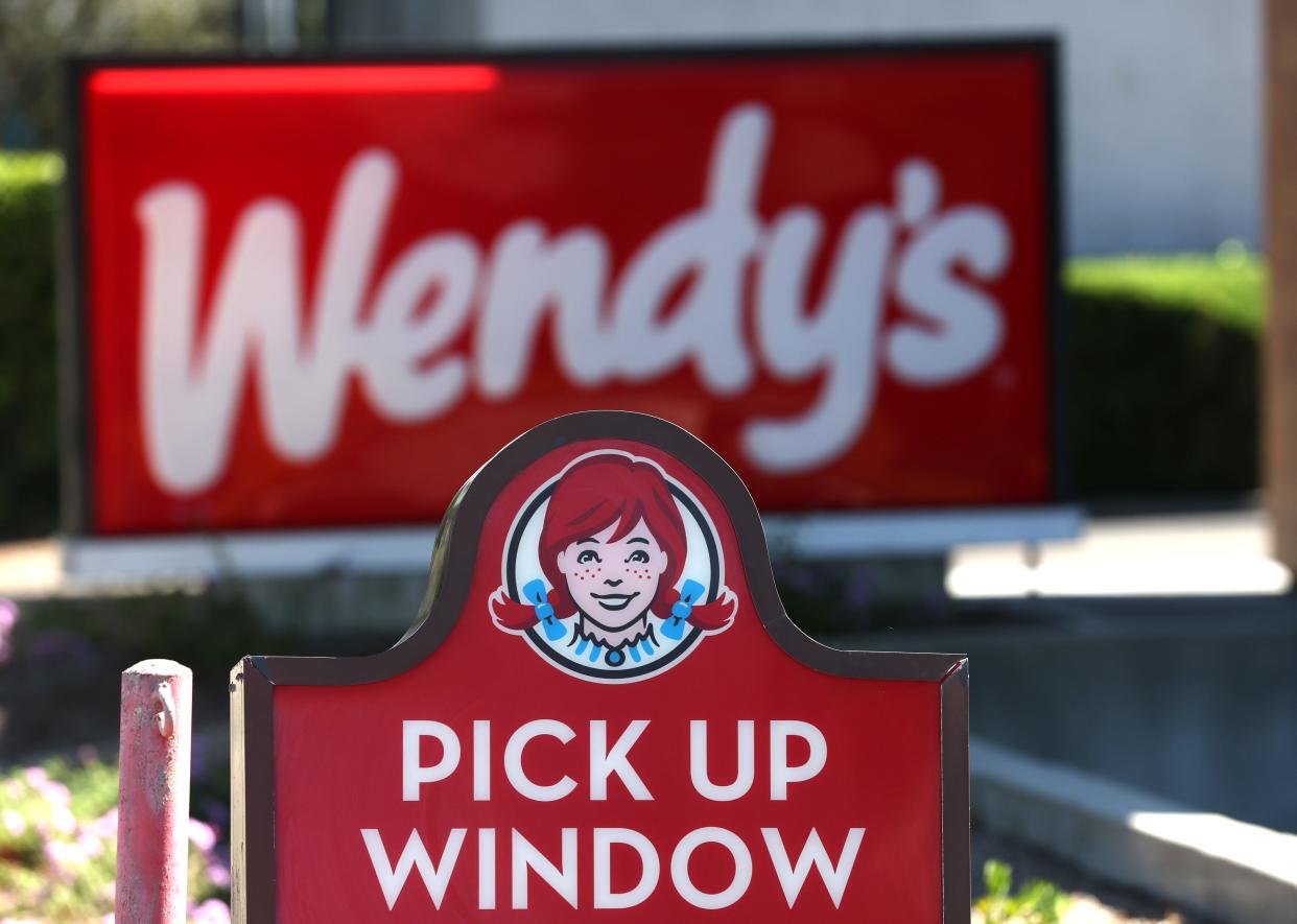 A sign is posted in front of a Wendy's restaurant on August 10, 022 in Petaluma, California.
