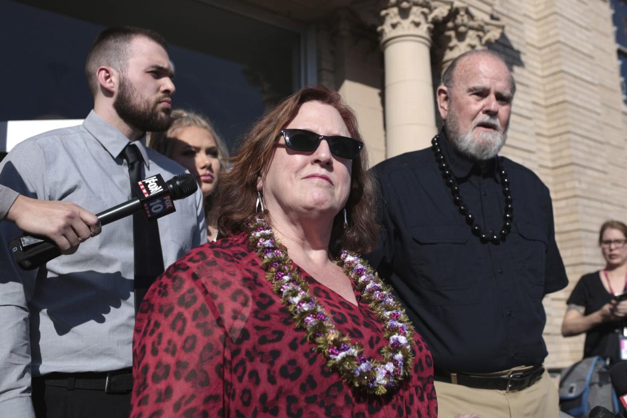 Kay Woodcock, center, and Larry Woodcock, right, address the media outside court at a hearing for Lori Vallow Daybell on Friday, March 6, 2020, in Rexburg, Idaho.