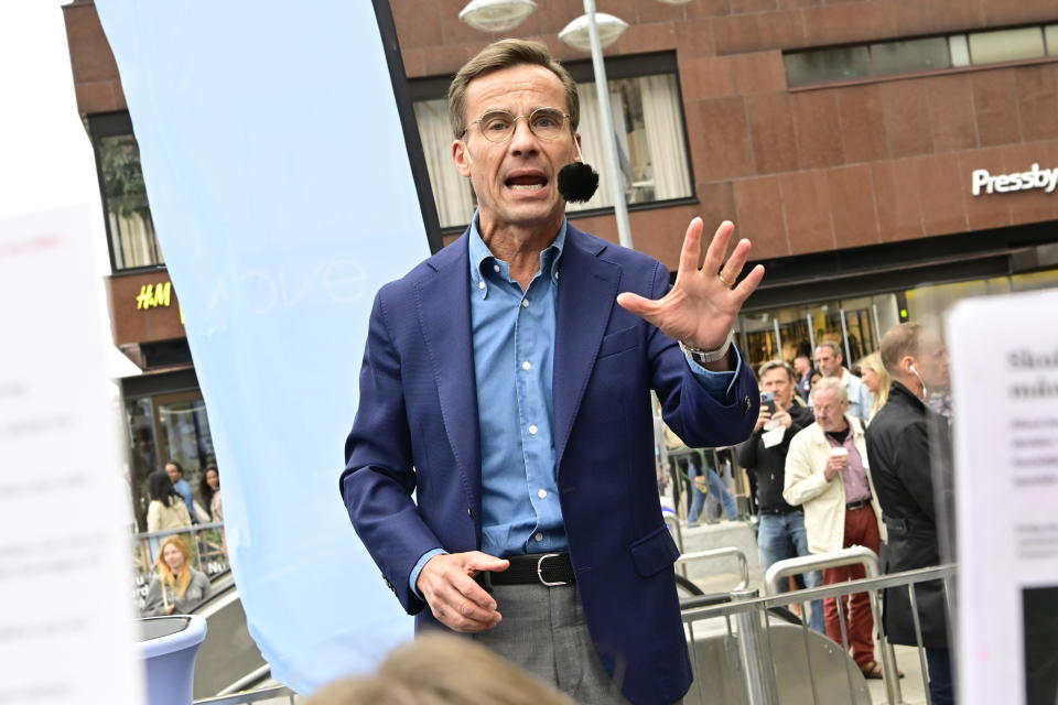 Moderate party leader Ulf Kristersson campaigns at Soltorget (Sergels torg) in Stockholm, Saturday, Sept. 10, 2022. Sweden is holding an election on Sunday to elect lawmakers to the 349-seat Riksdag as well as to local offices across the nation of 10 million people. (Jonas Ekstromer/TT News Agency via AP)