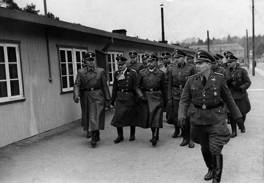 German Nazi party official and head of the SS, Heinrich Himmler, center, visits the Nazi concentration camp Stutthof in Sztutowo, Poland Nov. 23, 1941. (Stutthof Museum Archive via AP)