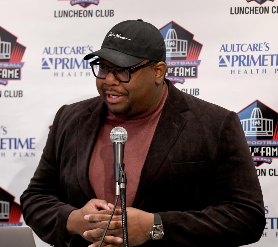 Canton native Garrett Bush, co-host of Ultimate Cleveland Sports Show, speaks during the Pro Football Hall of Fame Luncheon Club, Monday, April 24, 2023.