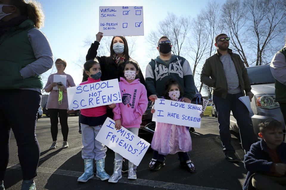 Families rally to reopen schools