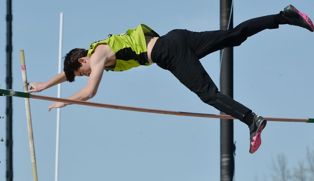 Union City High School sophomore Lucas Myer clears the bar while competing in the boys pole vault during the McDowell Invitational Track & Field meet.