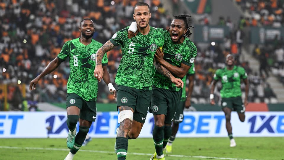 Captain William Troost-Ekong (center, number 5) celebrates after scoring a penalty during Nigeria's AFCON semi-final match against South Africa on February 7, 2024. - Issouf Sanogo/AFP/Getty Images