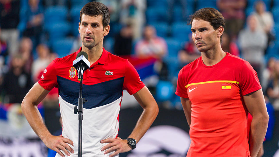 Novak Djokovic and Rafael Nadal, pictured here announcing the bushfire donation after the ATP Cup final.