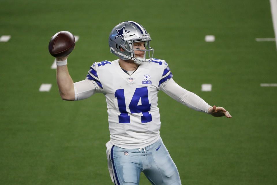 Dallas Cowboys' Andy Dalton (14) throws a pass in the second half of an NFL football game against the Arizona Cardinals in Arlington, Texas, Monday, Oct. 19, 2020. (AP Photo/Michael Ainsworth)