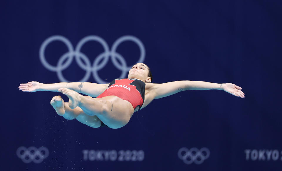 <p>TOKYO, JAPAN - JULY 30: Pamela Ware of Team Canada competes during the Women's 3m Springboard Preliminary round on day seven of the Tokyo 2020 Olympic Games at Tokyo Aquatics Centre on July 30, 2021 in Tokyo, Japan. (Photo by Ian MacNicol/Getty Images)</p> 