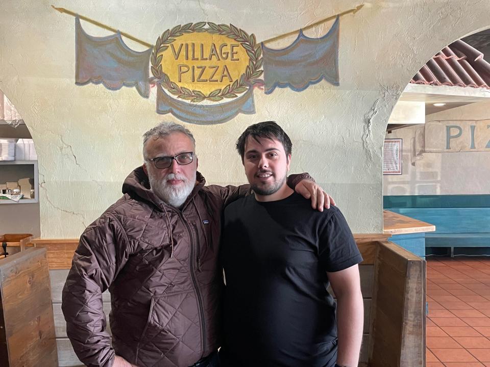 Adam Bardhi pictured with his nephew Omer Dernjani in their Village Pizza and Pasta location.