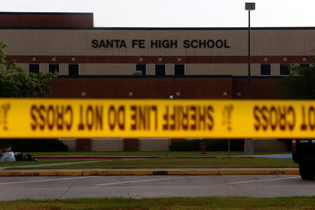 Police tape is seen near the site of the shooting at the Santa Fe High School in Santa Fe, Texas, U.S., May 20, 2018. REUTERS/Jonathan Bachman