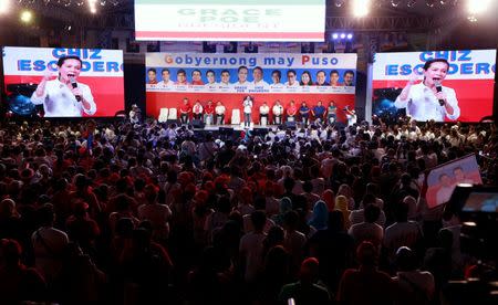 Presidential candidate senator Grace Poe gestures while addressing her supporters during the start of the national elections campaigning at Plaza Miranda, Quiapo, metro Manila, Philippines February 9, 2016. REUTERS/Romeo Ranoco