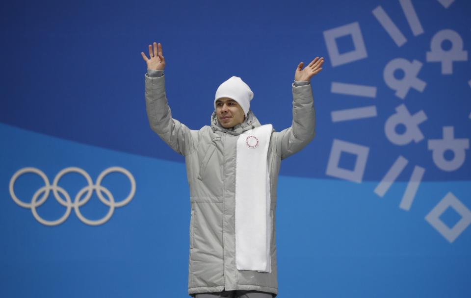 Semen Elistratov celebrates his bronze medal-winning performance. (Reuters)