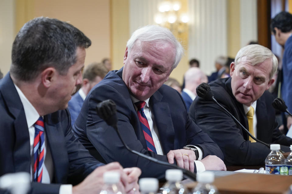 Steven Engel, former Assistant Attorney General for the Office of Legal Counsel, from left, Jeffrey Rosen, former acting Attorney General, and Richard Donoghue, former acting Deputy Attorney General, talk during a break as the House select committee investigating the Jan. 6 attack on the U.S. Capitol continues to reveal its findings of a year-long investigation, at the Capitol in Washington, Thursday, June 23, 2022. (AP Photo/Jacquelyn Martin)