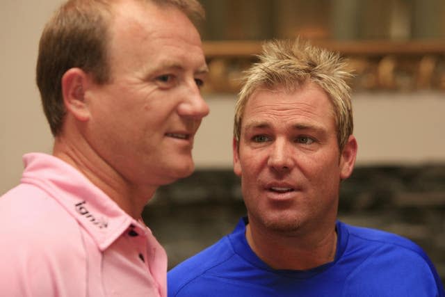 The death of Shane Warne, right, greatly affected Shaun Udal (Johnny Green/PA)