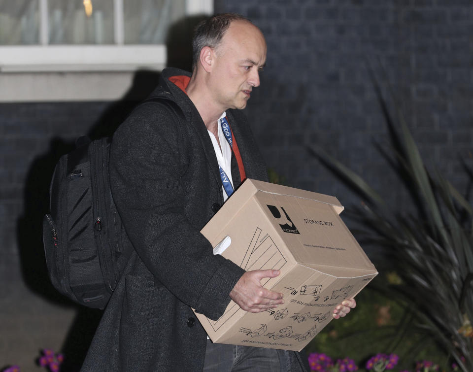 Britain's Prime Minister Boris Johnson's top aide Dominic Cummings leaves 10 Downing Street with a box, in London, Friday, Nov. 13, 2020. Late Wednesday, Lee Cain announced he was quitting as director of communications, a move that has sparked speculation that Dominic Cummings, Johnson's top adviser, could soon leave, further weakening the pro-Brexit camp. Both Cain and Cummings worked together on the 2016 Brexit referendum campaign that was largely fronted by Johnson. (Yui Mok/PA via AP)