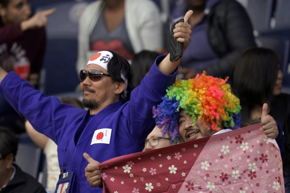 Japan's supporters cheer their team during the France 2019 Women's World Cup Group D football match between Argentina and Japan, on June 10, 2019, at the Parc des Princes stadium in Paris. (Photo by Kenzo TRIBOUILLARD / AFP) (Photo credit should read KENZO TRIBOUILLARD/AFP/Getty Images)