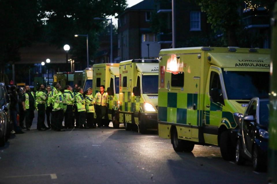 A fleet of ambulances at the scene ready to deal with the injured (AFP/Getty Images)