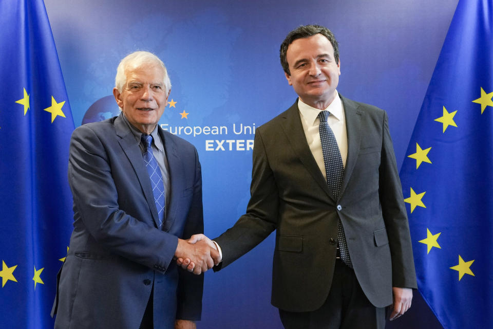 FILE - Kosovo's Prime Minister Albin Kurti, right, shakes hands with European Union foreign policy chief Josep Borrell prior to a meeting in Brussels, Thursday, Sept. 14, 2023. Kosovo’s Prime Minister on Monday, Sept. 18, 2023, accused the European Union special envoy in the normalization talks with Serbia of not being “neutral and correct” and “coordinating” with Belgrade against Pristina. EU foreign policy chief Josep Borrell, who supervised the talks in Brussels, blamed the latest breakdown on Kurti’s insistence that Serbia should essentially recognize his country before progress could be made on enforcing a previous agreement reached in February. (AP Photo/Virginia Mayo, File)