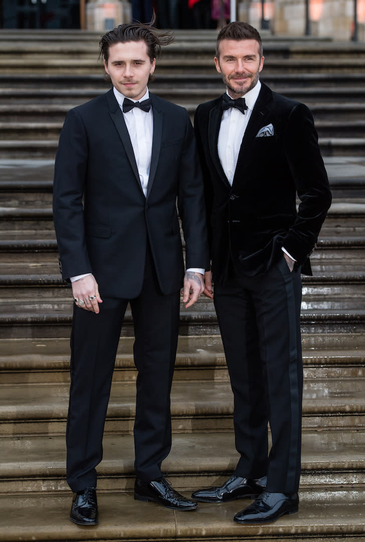 <p>On April 4, the father-son duo shared a fashion moment at the premiere of ‘Our Planet’ at the Natural History Museum. <em>[Photo: Getty]</em> </p>