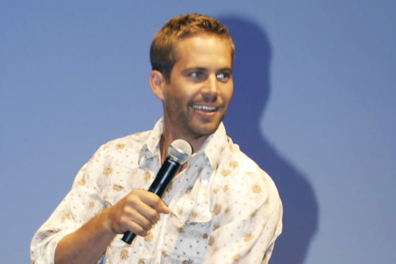 Paul Walker attends a premiere of the film "Fast & Furious" in Tokyo on September 30, 2009. On November 30, 2013, a fiery car crash in Southern California killed the actor and his friend, Roger Rodas. File Photo by Keizo Mori/UPI
