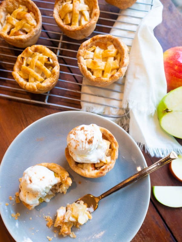 <p>Parade</p><p>These mini apple pies have a lattice crust and colorful filling, but no one will know how easy they were to make when they see and taste them!</p><p><strong>Get the recipe: <a href="https://parade.com/916948/parade/mini-apple-pies-recipe/" rel="nofollow noopener" target="_blank" data-ylk="slk:Mini Apple Pies;elm:context_link;itc:0;sec:content-canvas" class="link rapid-noclick-resp">Mini Apple Pies</a></strong></p>