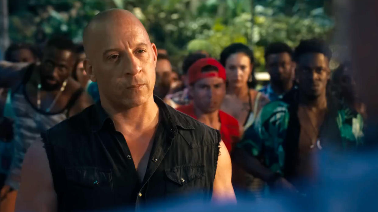  Vin Diesel as Dom Toretto in Fast X, in a crowd of people 