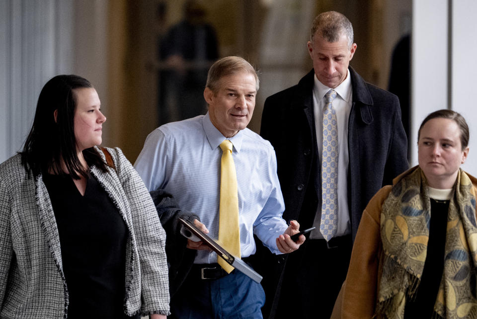 Rep. Jim Jordan, R-Ohio, center, and Republican staff attorney Steve Castor, second from right, arrive for a private interview with James Biden, the brother of President Joe Biden, at Thomas P. O'Neill House Office Building on Capitol Hill in Washington, Wednesday, Feb. 21, 2024. (AP Photo/Andrew Harnik)
