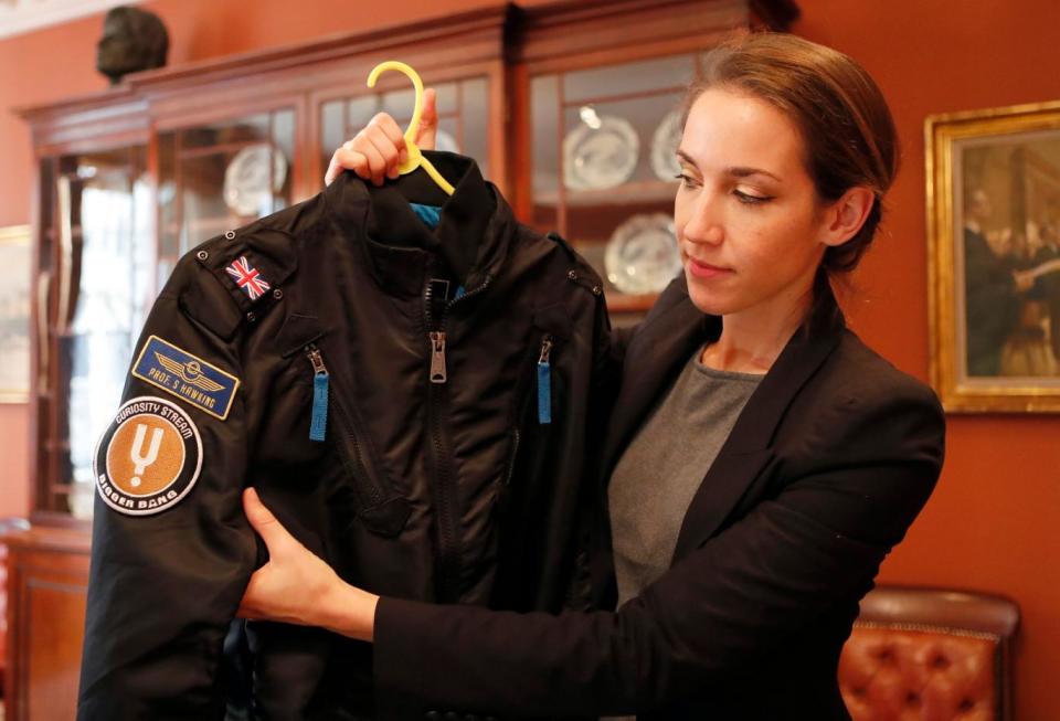 A bomber jacket given to Stephen Hawking is one of the personal and academic possessions at the Christie's auction (Frank Augstein/AP)