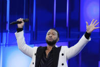 John Legend performs during the Democratic National Convention Wednesday, Aug. 21, 2024, in Chicago. (AP Photo/Brynn Anderson)