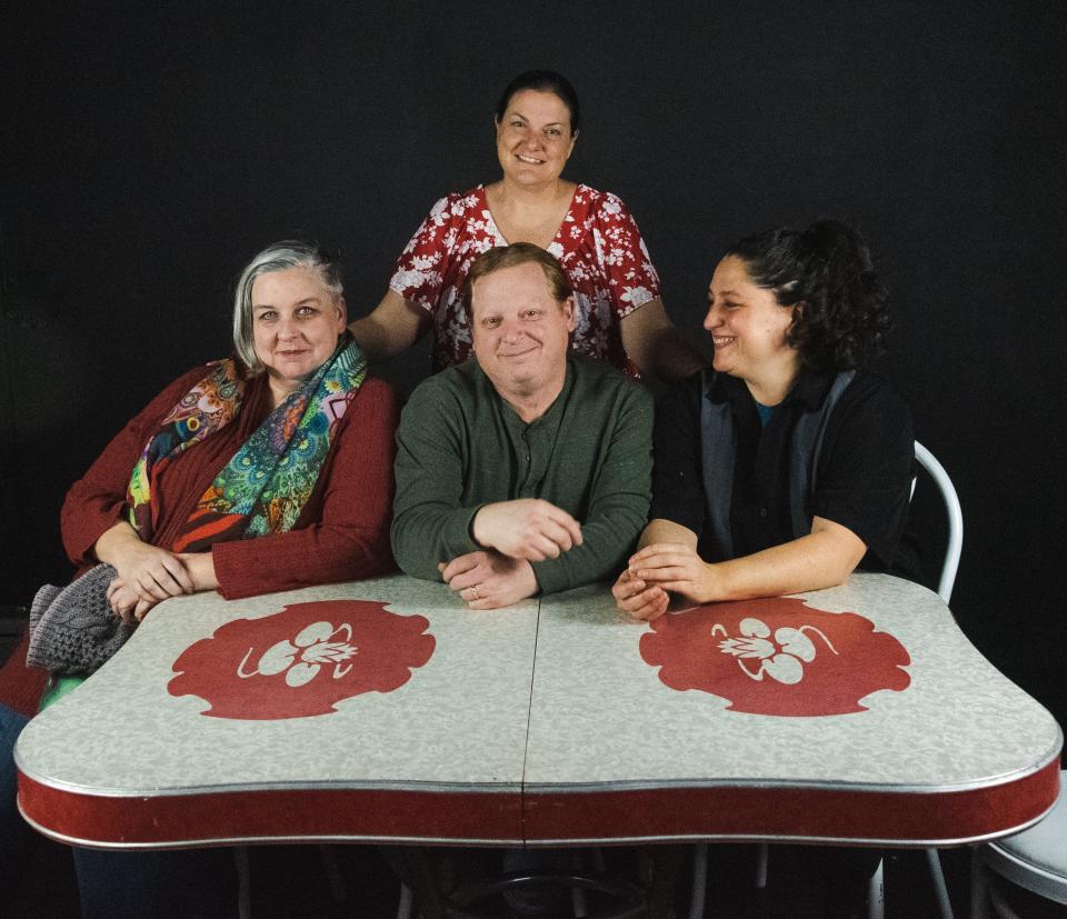The cast of "Miracle on South Division Street" gathered at the Nowak family's 50s table with mismatched chairs are mom, Clara (Stephanie Clark), and seated, left to right, adult children Ruth (Jess Wilson), Jimmy (Garrett Olson) and Beverly (Victoria Smith).