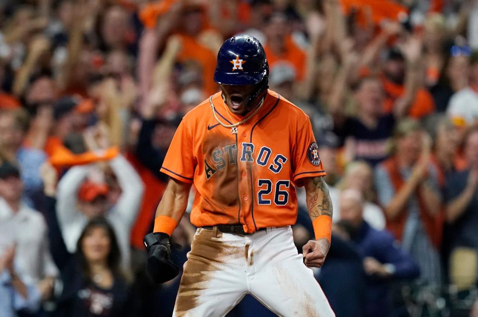 Astros center fielder Jose Siri celebrates after scoring in the second inning.