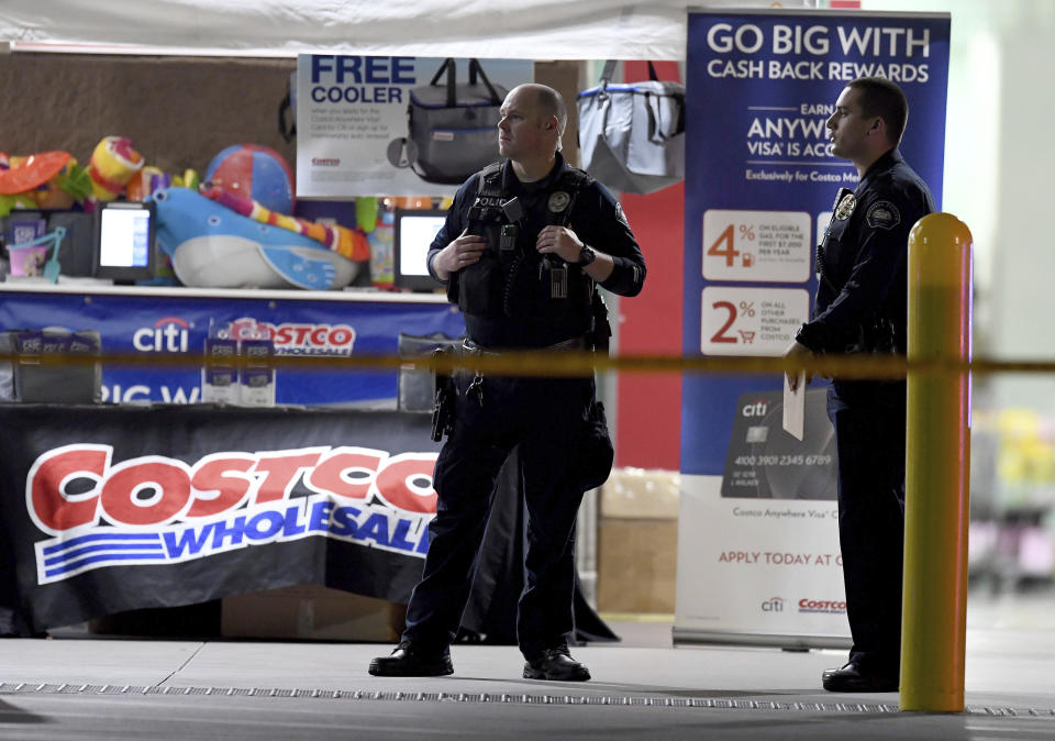 The Corona police department investigate a shooting inside a Costco in Corona, Calif., Friday, June 14, 2019. A gunman opened fire inside the store during an argument, killing a man, wounding two other people and sparking a stampede of terrified shoppers before he was taken into custody, police said. The man involved in the argument was killed and two other people were wounded, Corona police Lt. Jeff Edwards said. (Will Lester/Inland Valley Daily Bulletin/SCNG via AP)