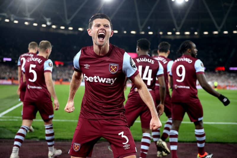 West Ham United's Aaron Cresswell celebrates scoring their side's third goal of the game during the UEFA Europa League Round of 16, second leg soccer match between West Ham United and SC Freiburg at the London Stadium. Nigel French/PA Wire/dpa