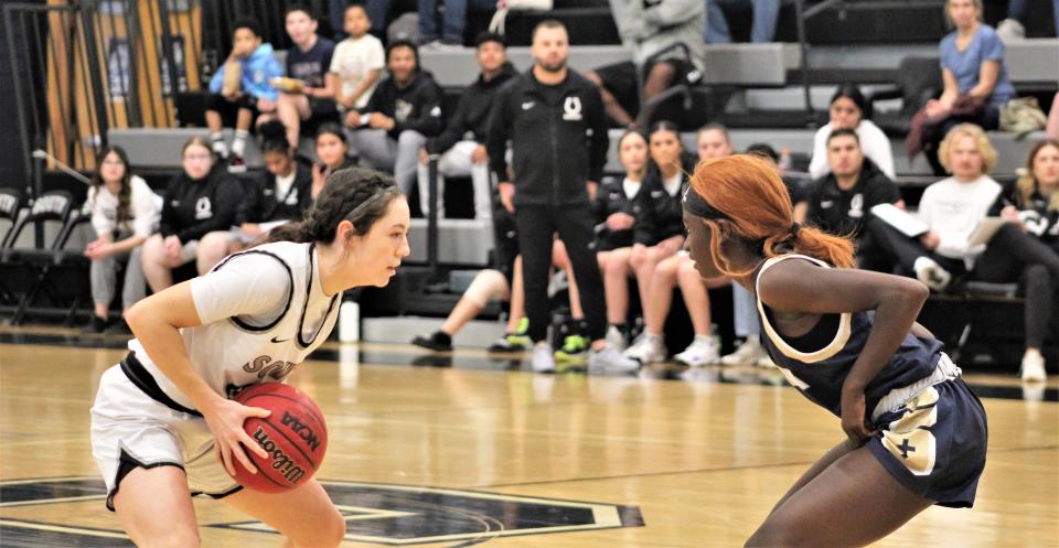 Madison Doverspike of Pueblo South sizes up her defender from Colorado Springs Christian in a game held at Pueblo South High School on Jan. 14, 2023