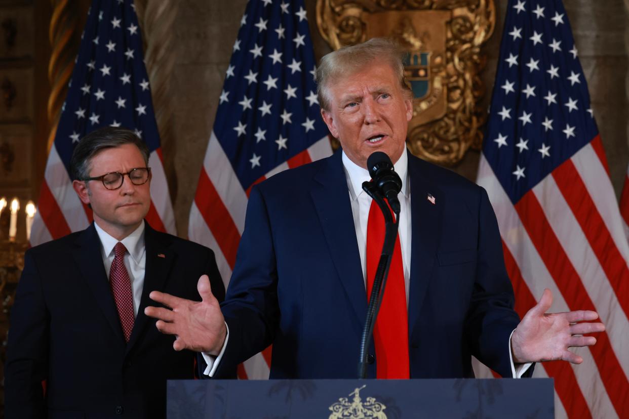 Republican presidential candidate former President Donald Trump and Speaker of the House Mike Johnson hold a press conference at Trump's Mar-a-Lago estate on April 12 in Palm Beach, Florida.