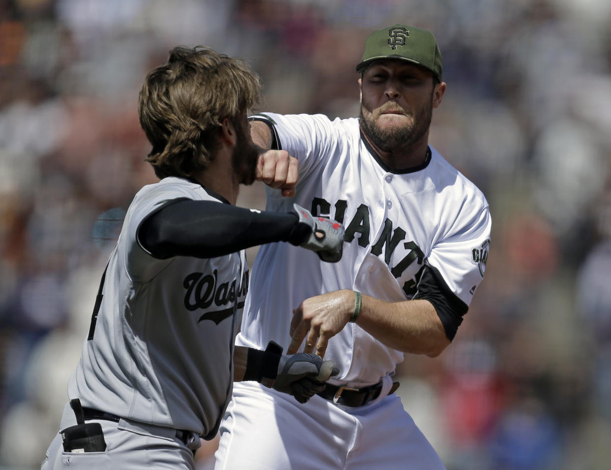 Washington Nationals' Bryce Harper, left, prepares to hit San Francisco Giants' Hunter Strickland after being hit with a pitch in the eighth inning of a baseball game Monday, May 29, 2017, in San Francisco. (AP Photo/Ben Margot)