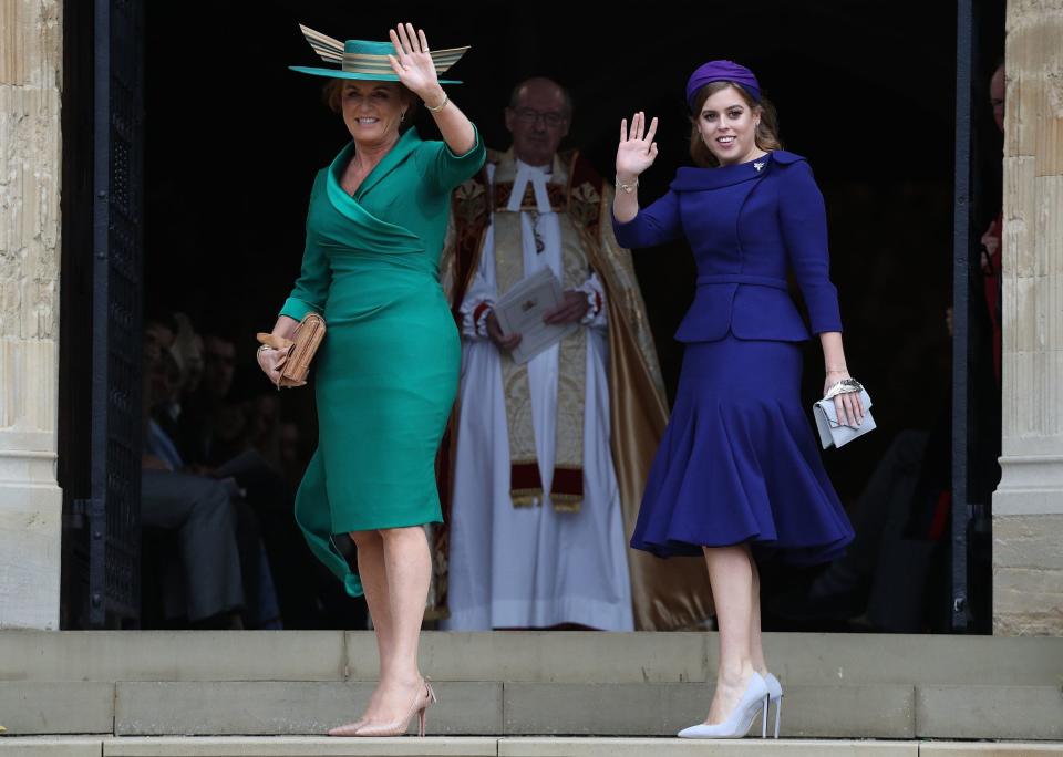 Mother of the bride, Sarah, Duchess of York (L) and Britain's Princess Beatrice of York arrive to attend the wedding of Britain's Princess Eugenie of York to Jack Brooksbank in 2018  - AFP 