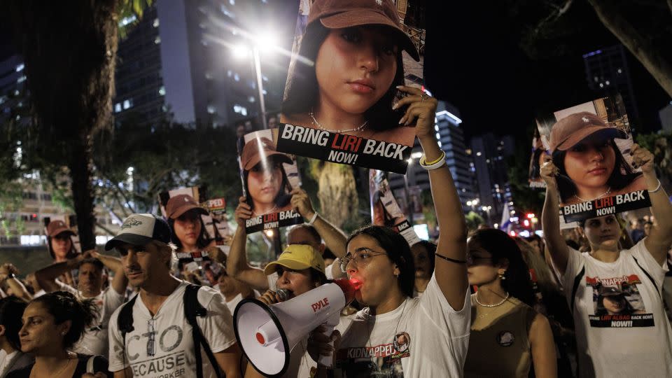 Families of kidnapped hostages join thousands of supporters in a protest to demand that Israeli Prime Minister Benjamin Netanyahu secure the release of Israeli hostages, outside HaKirya on November 4, 2023 in Tel Aviv, Israel. - Dan Kitwood/Getty Images