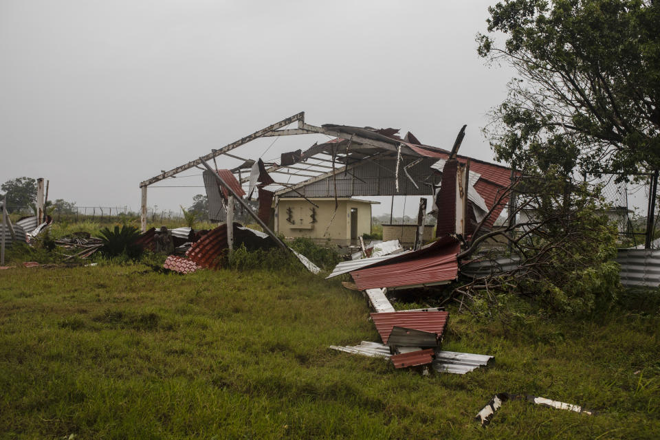 Pieces of roof lay on the ground in the aftermath of Hurricane Grace, in Tecolutla, Veracruz State, Mexico, Saturday, Aug. 21, 2021. Grace hit Mexico’s Gulf shore as a major Category 3 storm before weakening on Saturday, drenching coastal and inland areas in its second landfall in the country in two days. (AP Photo/Felix Marquez)
