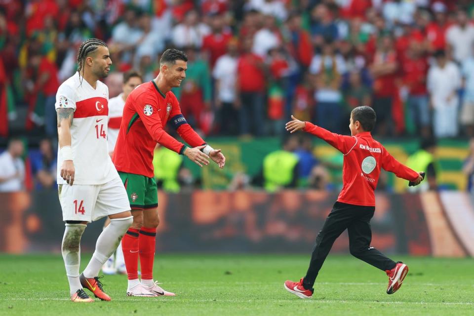 Ronaldo welcomed the young fan and was happy to pose for a picture (Getty Images)