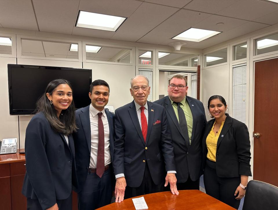 Laurens Van Beek, second from right, meets with Sen. Chuck Grassley, center, in May 2023 on Capitol Hill.