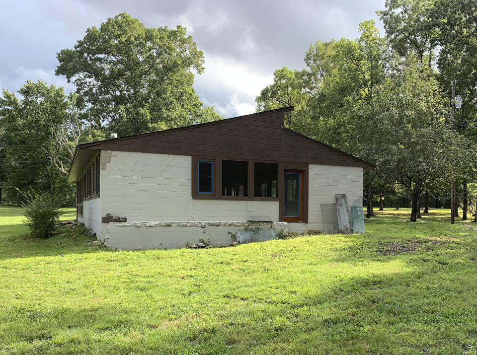 This 2019 photo shows the library building of Highlander Folk School in New Market, Tenn. A fight is brewing in Tennessee over the legacy of a legendary social justice school that counts Rosa Parks among its alumni and Eleanor Roosevelt among its supporters. One of the few buildings left is the Highlander library. Preservationists restored the building and want it listed on the National Register of Historic Places. But the Highlander Research and Education Center never stopped working from a new location.(David Currey via AP)