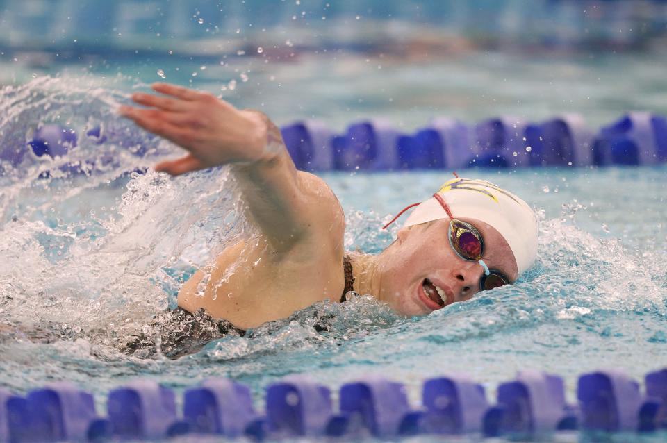 Erin DeHollander of Victor/Bloomfield comes from behind to win the 200 yard IM.