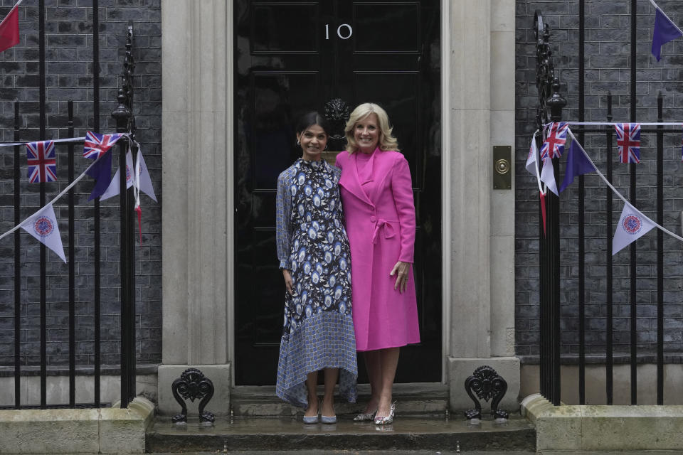 Akshata Murty wife of the British Prime Minister greets the US First Lady Jill Biden on the doorstep of 10 Downing Street in London, Friday, May 5, 2023. The First Lady is in London to attend the Coronation of King Charles III, on Saturday May, 6.(AP Photo/Kin Cheung)